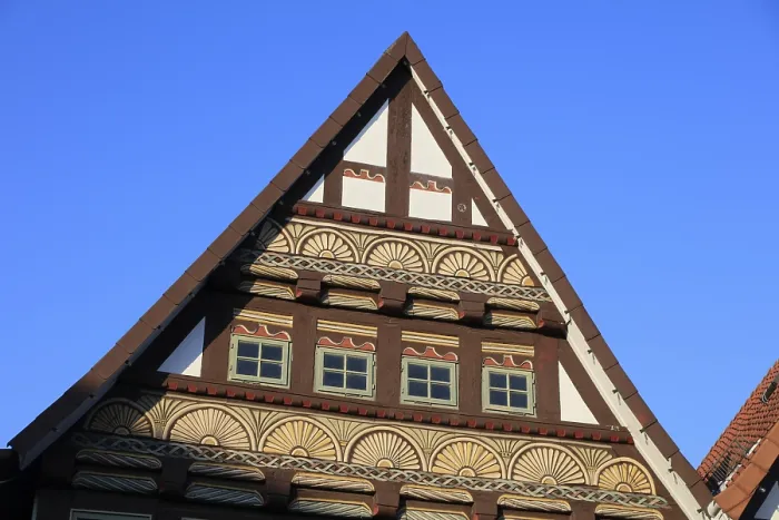 Framed Print : Colourfully painted gable of a half-timbered house