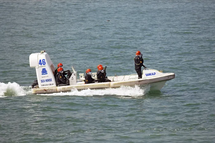 Framed Print : Commandos in speed boat rescue operation