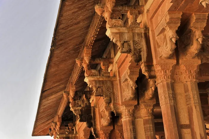 Framed Print : Complex design of architectural ornaments and a stone roof on a historic building