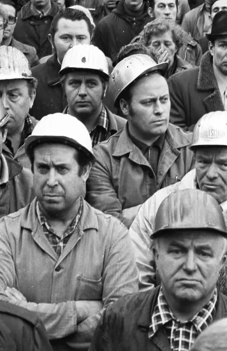 Framed Print : The concern for their jobs is written all over the faces of the workers Framed Print : The concern for their jobs is written all over the faces of the workers