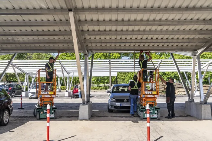 Framed Print : Construction of a carport photovoltaic system