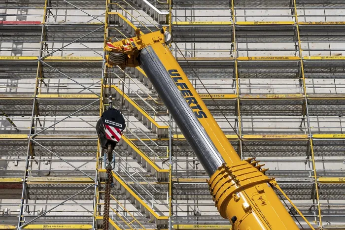 Framed Print : Construction machinery and materials at a building site Framed Print : Construction machinery and materials at a building site