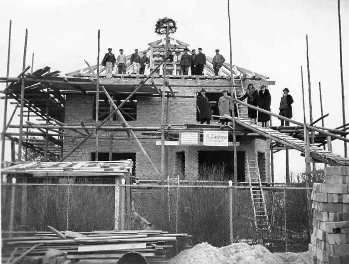 Framed Print : Construction workers, topping-out ceremony