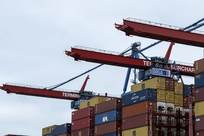 Framed Print : Containers and container gantry cranes against a grey sky at the Burchardkai container terminal in the port of Hamburg