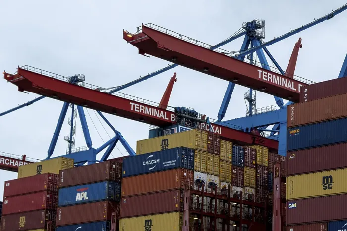 Framed Print : Containers and container gantry cranes against a grey sky at the Burchardkai container terminal in the port of Hamburg Framed Print : Containers and container gantry cranes against a grey sky at the Burchardkai container terminal in the port of Hamburg