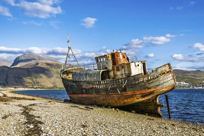 Framed Print : Corpach Wreck or Old Boat of Caol and Nevis Range Mountains