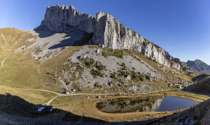 Framed Print : Cottage on Lac d'Ai below Tour d'Ai rock face Framed Print : Cottage on Lac d'Ai below Tour d'Ai rock face