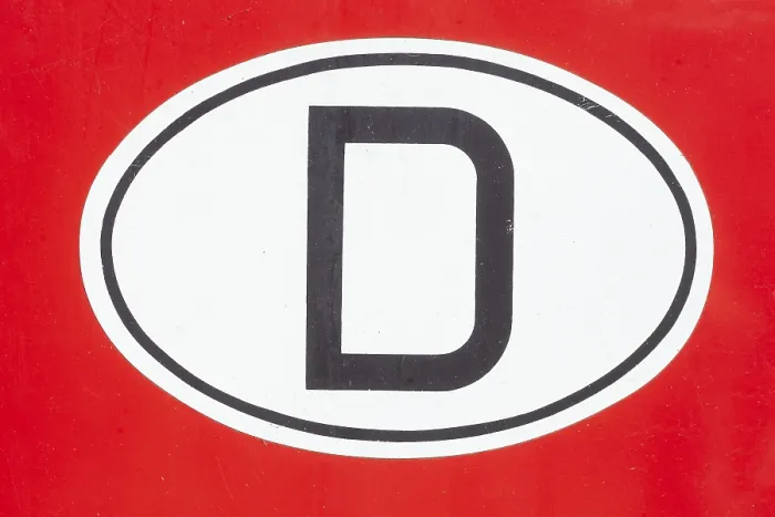 Framed Print : Country code D for Germany on a red vintage car Framed Print : Country code D for Germany on a red vintage car