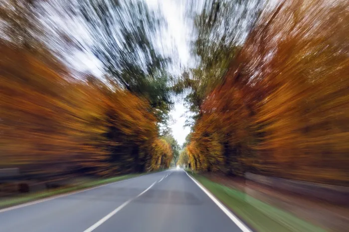 Framed Print : Country road through autumn forest