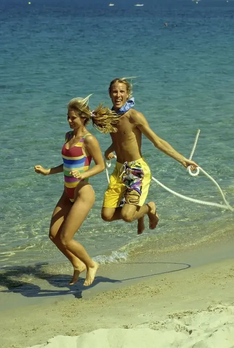 Framed Print : Couple on the beach, beach running and jumping rope