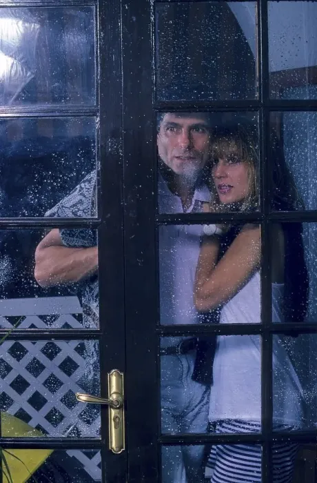 Framed Print : Couple looking out of the window Rainy weather