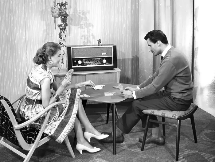 Framed Print : Couple playing cards in the living room
