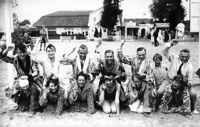 Framed Print : Couples, funny bath group, the men ride on the back of their women Framed Print : Couples, funny bath group, the men ride on the back of their women