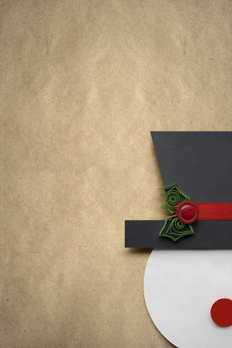Framed Print : Creative photo of a paper snowman on a brown background