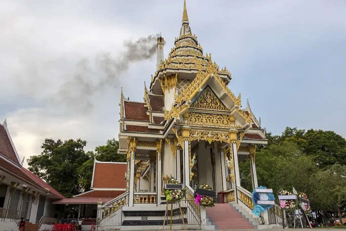 Framed Print : Crematorium in Buddhist monastery with smoke rising from chimney after funeral ceremony
