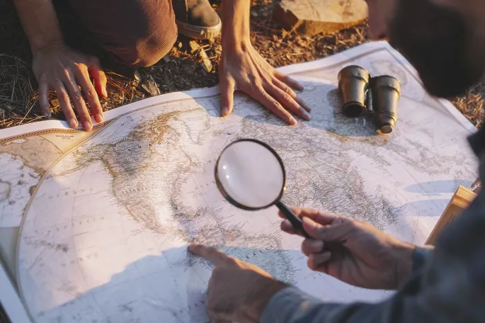 Framed Print : Crop man exploring map
