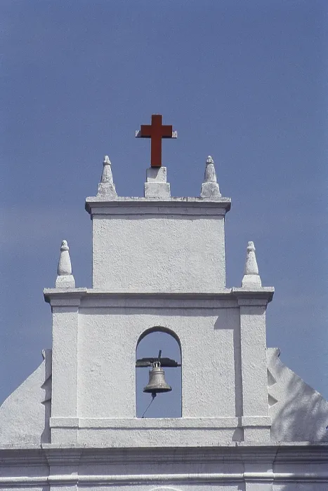 Framed Print : Cross & bell over church at Mangeshi