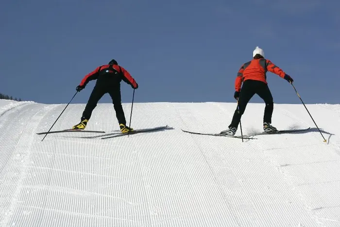 Framed Print : Cross-country skiing, skiers walking uphill Framed Print : Cross-country skiing, skiers walking uphill