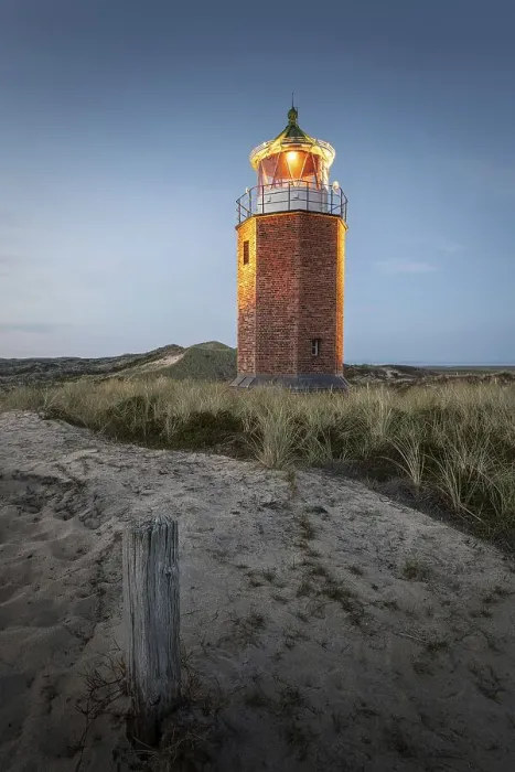 Framed Print : Cross light, lighthouse with sand dune in the evening light