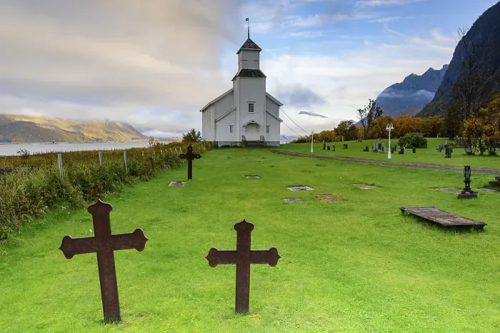 Framed Print : Crosses in cemetery and church