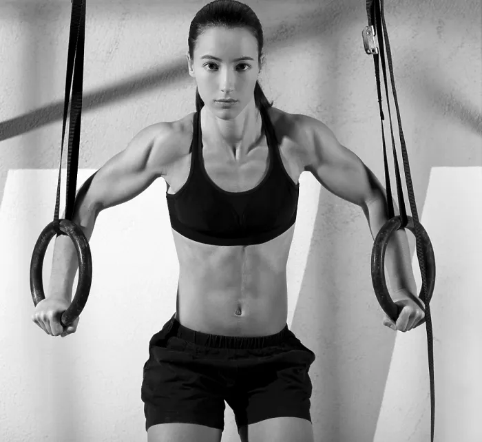Framed Print : Crossfit dip ring woman workout at gym dipping exercise Framed Print : Crossfit dip ring woman workout at gym dipping exercise