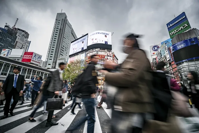 Framed Print : Crowd crossing zebra crossing on a large intersection