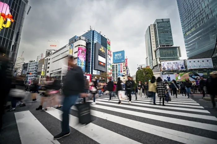 Framed Print : Crowd crossing zebra crossing on a large intersection