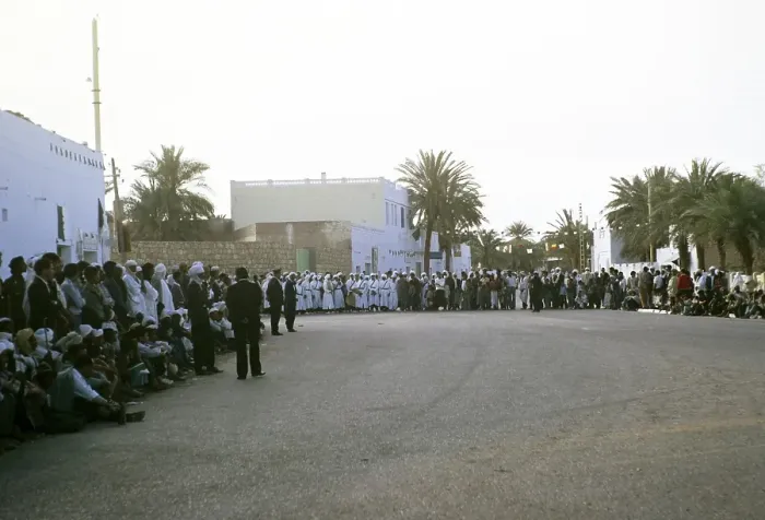Framed Print : Crowd waiting for the arrival of the President during a visit to El Golea, now called El Menia, Algeria, North Africa 1973, Africa