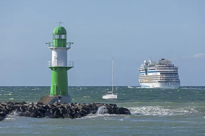 Framed Print : Cruise ship AIDA nova leaving, lighthouse