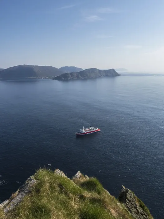 Framed Print : A cruise ship passes the island of Runde off the Norwegian coast