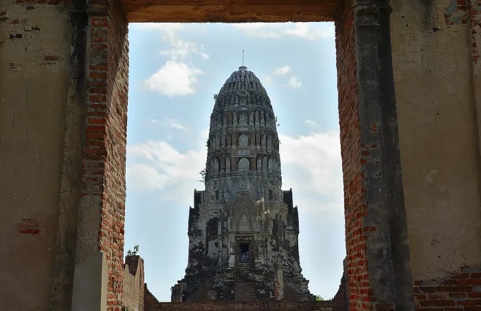 Framed Print : Crumbling brick walls frame a majestic ancient prang under a partly cloudy sky