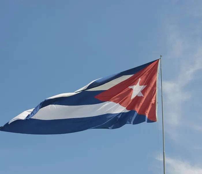 Framed Print : Cuba flag against blue sky and sunshine Cuba flag in front of blue sky and sunshine