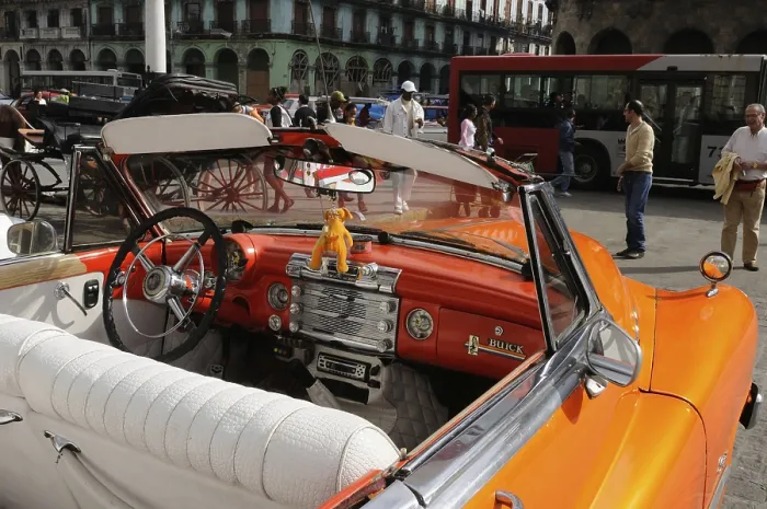 Framed Print : Cuba: Orange Buick vintage car in front of the capitolio in the capital city Havana