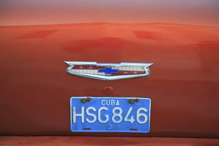 Framed Print : Cuban licence plate on a vintage car in Havana