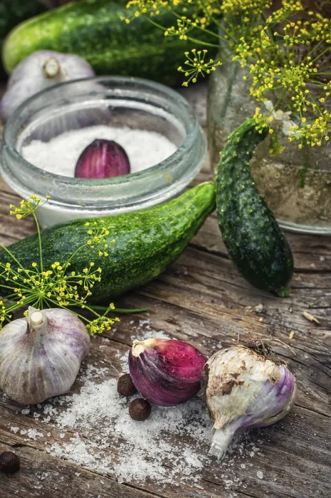 Framed Print : Cucumber pickled with dill and garlic on wooden table Framed Print : Cucumber pickled with dill and garlic on wooden table