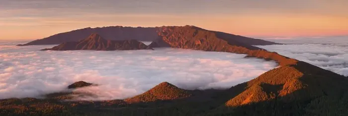 Framed Print : Cumbre Nueva and Cumbre Vieja mountains at sunset above clouds