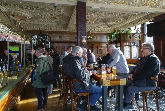Framed Print : Customers in public bar inside Crown Hotel pub in city centre of Liverpool