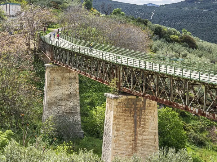 Framed Print : Cyclist on a bridge, cycle path Via Verde Del Aceite Framed Print : Cyclist on a bridge, cycle path Via Verde Del Aceite