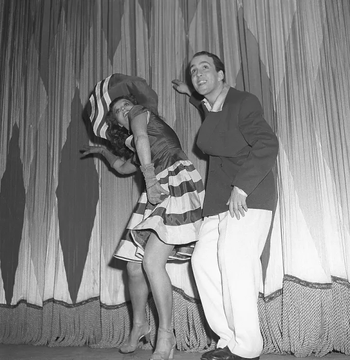 Framed Print : Dancing in the 1940s. A couple in full figure pictured when dancing Hokey Cokey