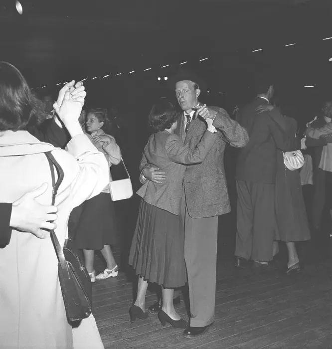 Framed Print : Dancing in the 1940s. A young couple at a dance event is whirling around on the dance floor Framed Print : Dancing in the 1940s. A young couple at a dance event is whirling around on the dance floor