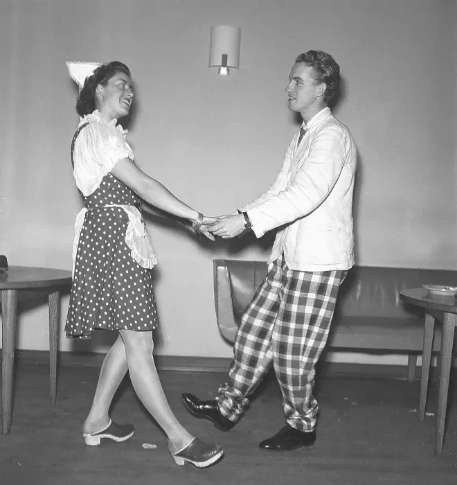 Framed Print : Dancing in the 1940s. A young couple at the theatre dancing together in their stage costumes