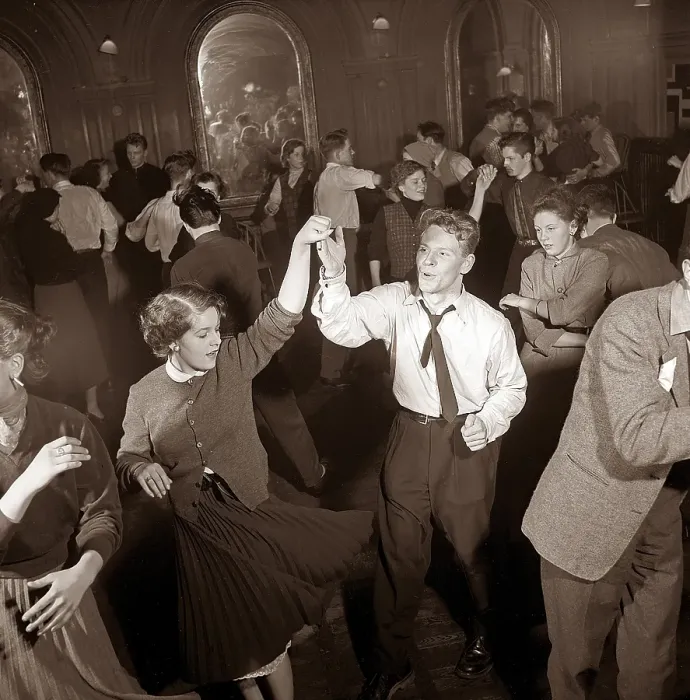 Framed Print : Dancing in the 1950s. The dance floor is filled with dancing couples moving to the music Framed Print : Dancing in the 1950s. The dance floor is filled with dancing couples moving to the music