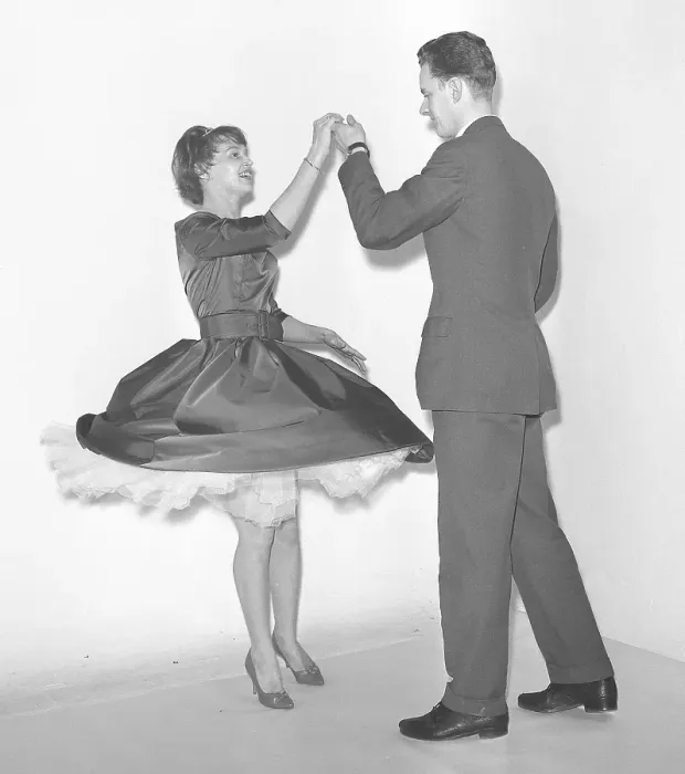 Framed Print : Dancing in the 1950s. A young couple is dancing in the 1950