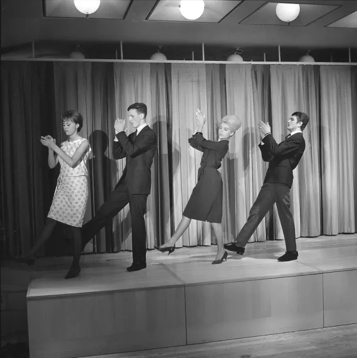 Framed Print : Dancing in the 1960s. The dance Hully Gully is being made popular and here are men and women dancing the new craze