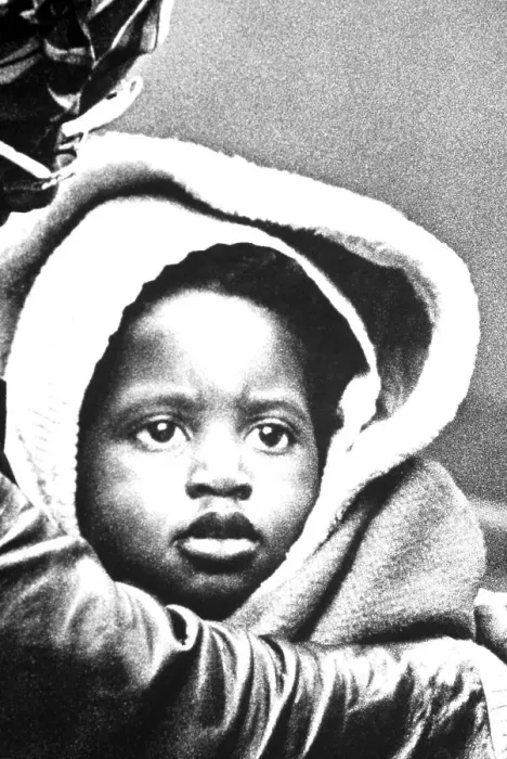 Framed Print : Dark skinned child with sad look