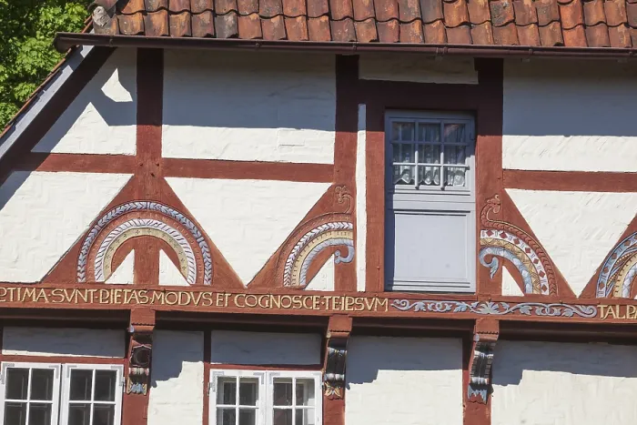 Framed Print : Decorated beams on a historic half-timbered house in Lune Abbey