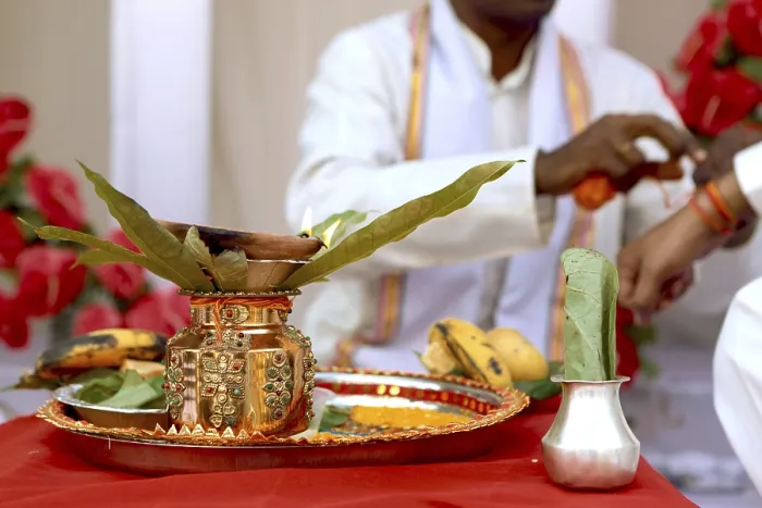 Framed Print : Decorative copper vessel with mango leaves offering to lord Wedding India Framed Print : Decorative copper vessel with mango leaves offering to lord Wedding India