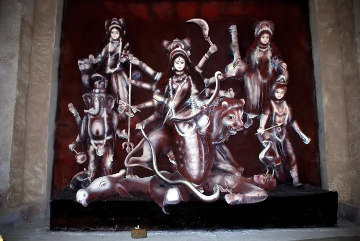 Framed Print : Decorative Durga clay model killing demon mahishasura with statues of kartikeya ganesha