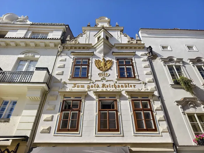 Framed Print : Decorative historic facade with eagle on a bright blue sky Old town Burgerhaus Zum goldenen Reichsadler Krems