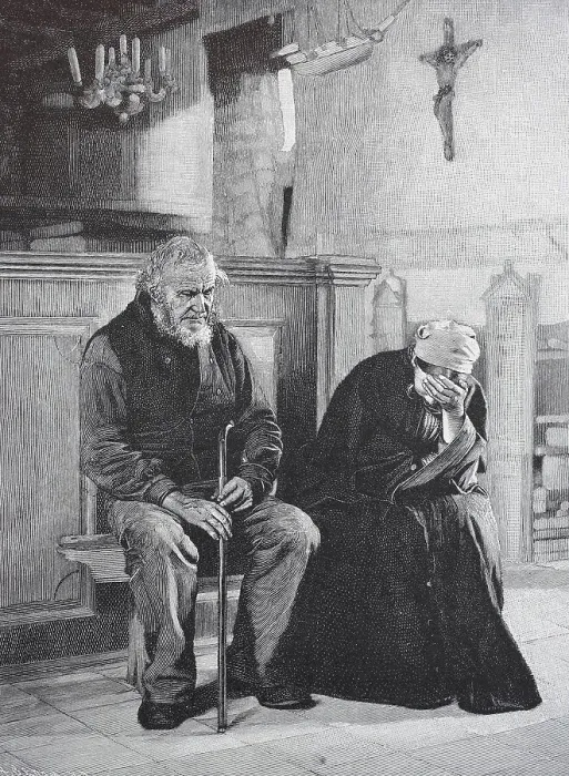 Framed Print : In deep mourning, two grieving old people in church